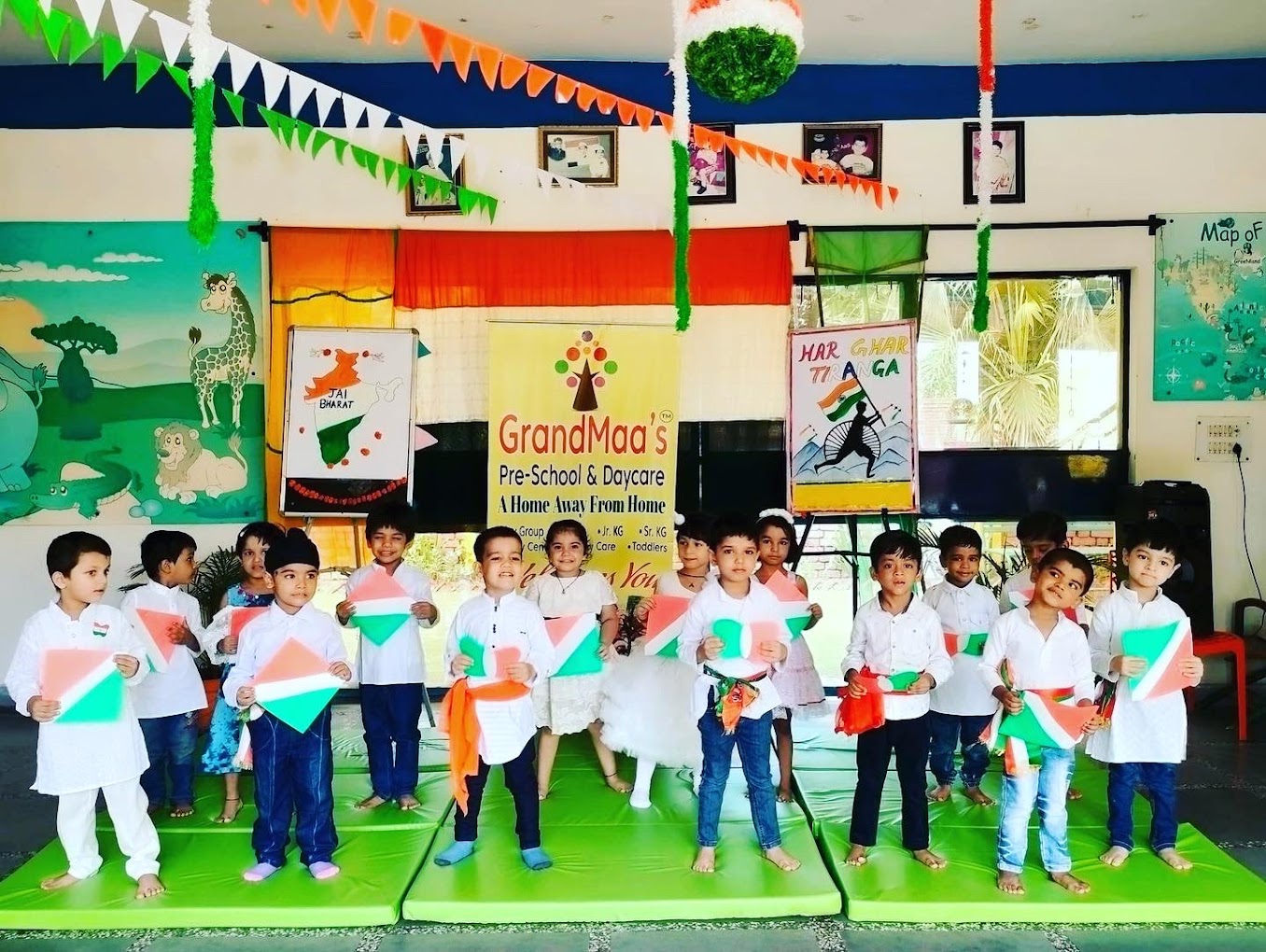 Children celebrating with handmade kites in classroom at Grandmaa's Preschool & DayCare, Greater Noida